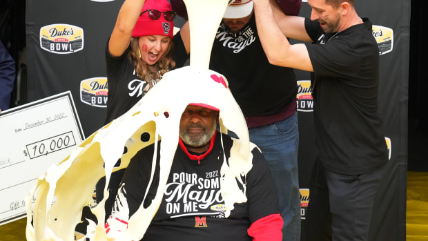 Dec 30, 2022; Charlotte, NC, USA; Maryland Terrapins head coach Mike Locksley is doused in Mayonnaise after Maryland wins the 2022 Duke's Mayo Bowl at Bank of America Stadium. Mandatory Credit: Bob Donnan-USA TODAY Sports  